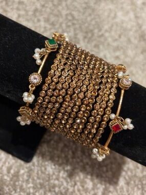 Gold-Tone Multi-Row Kundan-Style Bracelet with Red & Green Accents